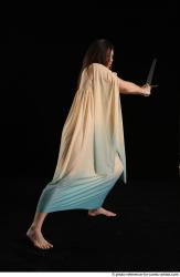 Woman Adult Average Fighting with sword Standing poses Casual Latino